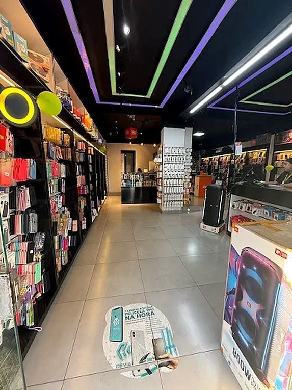 JBL e lançamentos na vitrine — loja Mania Cell em Barra do Garças